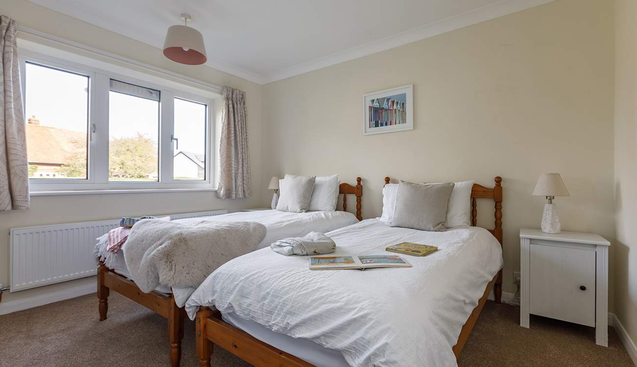 A welcoming twin bedroom; perfect for adults or children