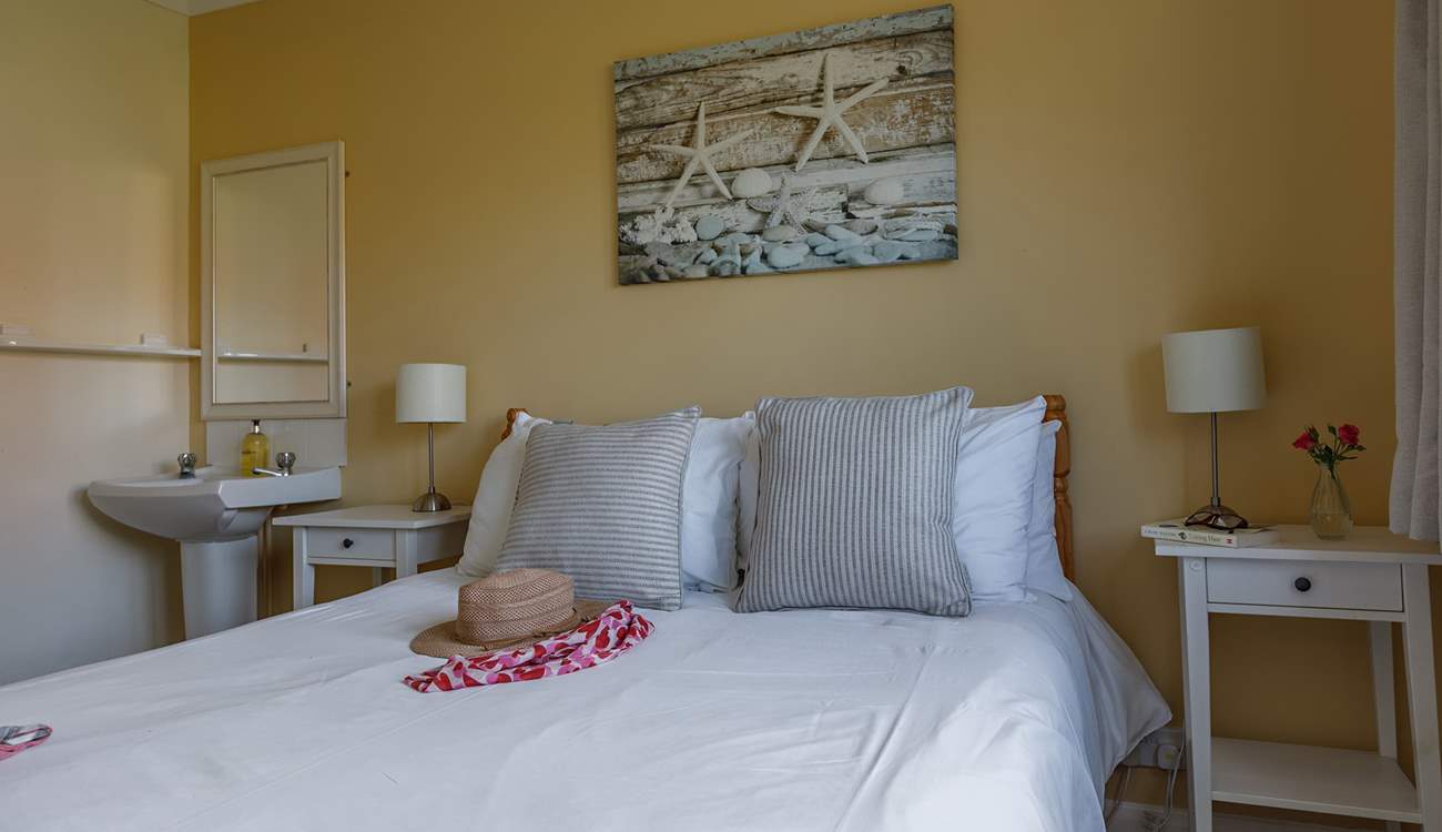 The double room is relaxed and comfy; enjoying the evening sun.