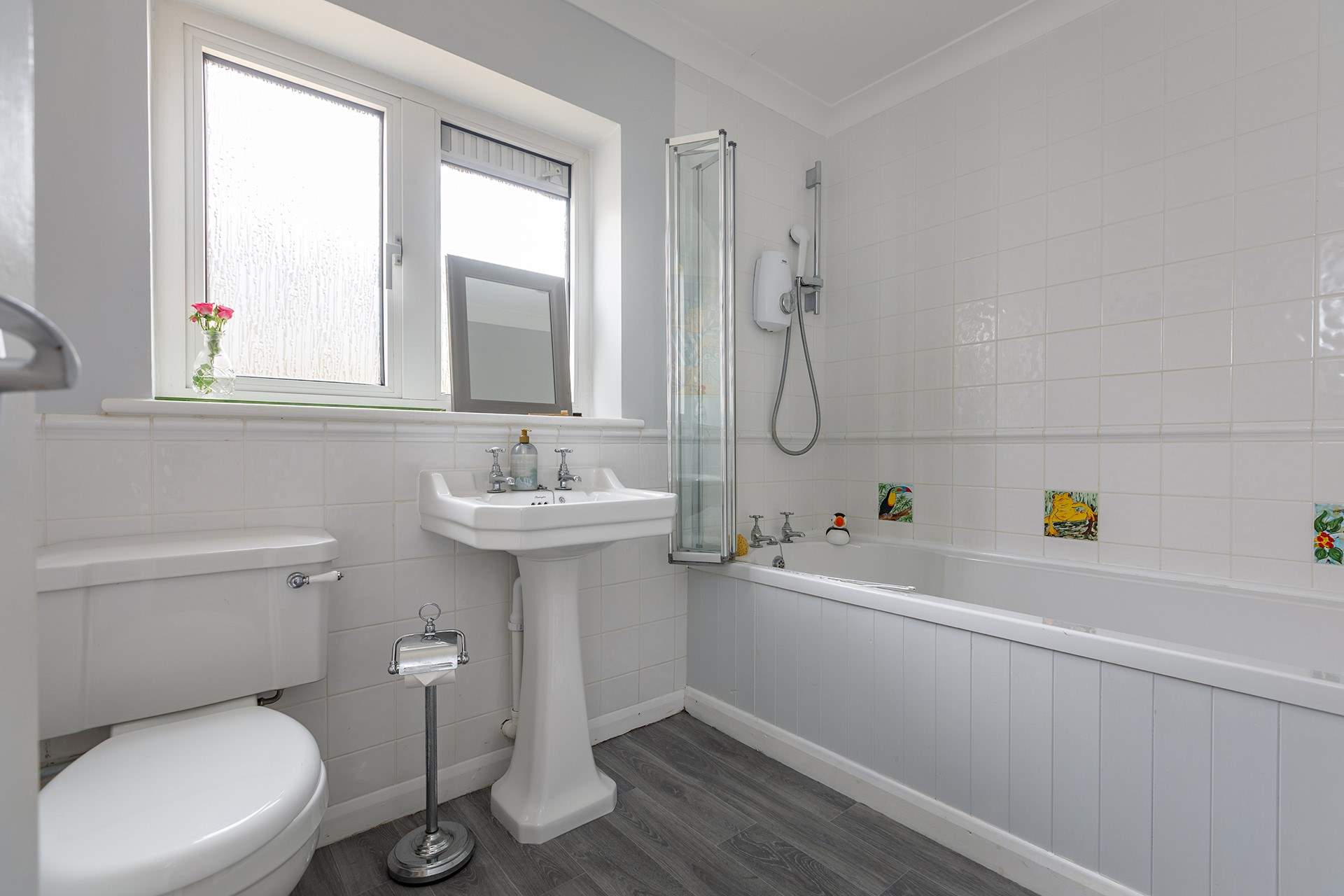 Family bathroom with electric shower, perfect for youngsters to wash off those sandy toes.