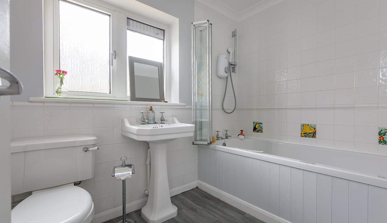 Family bathroom with electric shower, perfect for youngsters to wash off those sandy toes.