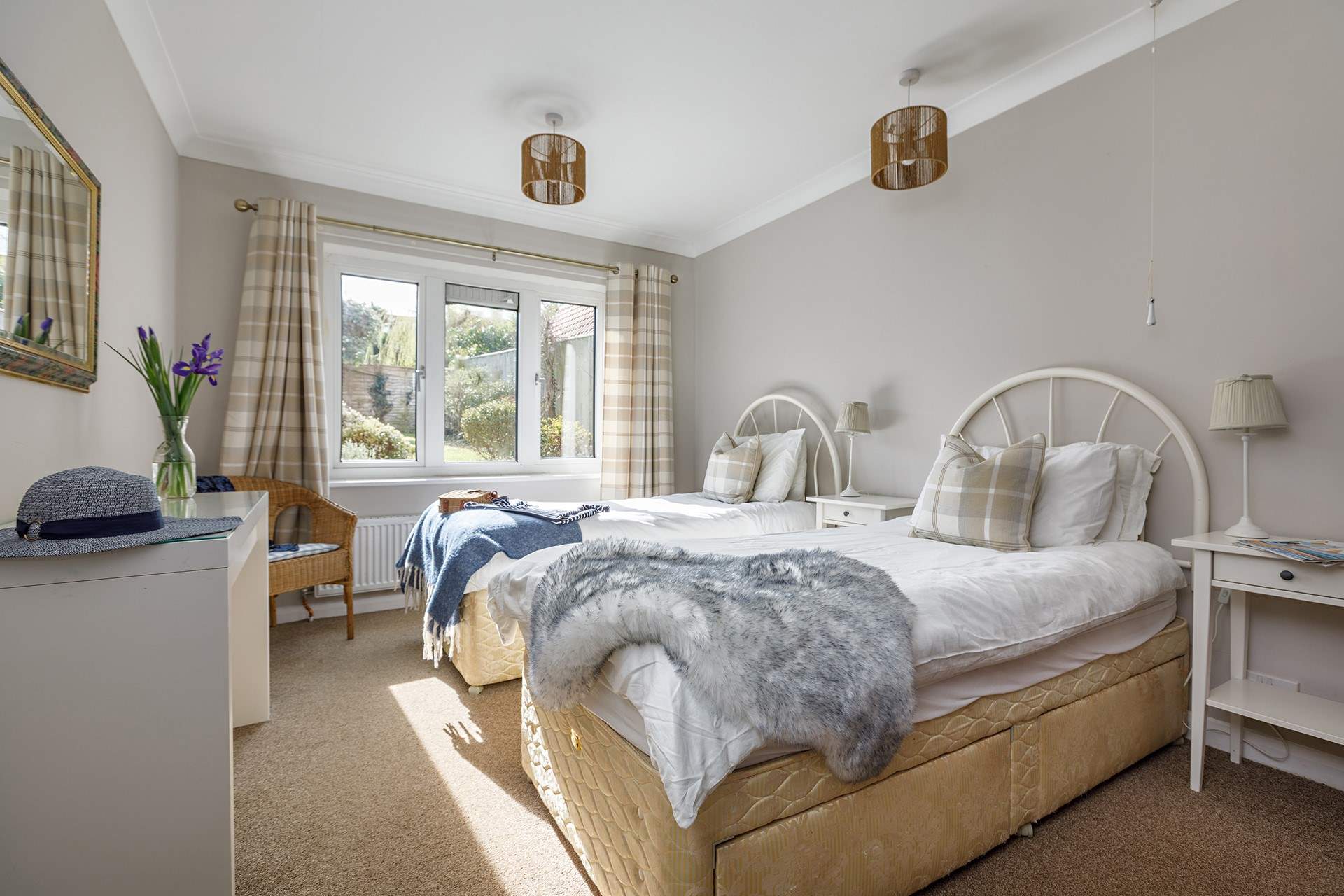 A spacious twin room with full size (three foot) beds, enjoys garden views and a spacious en suite shower-room.