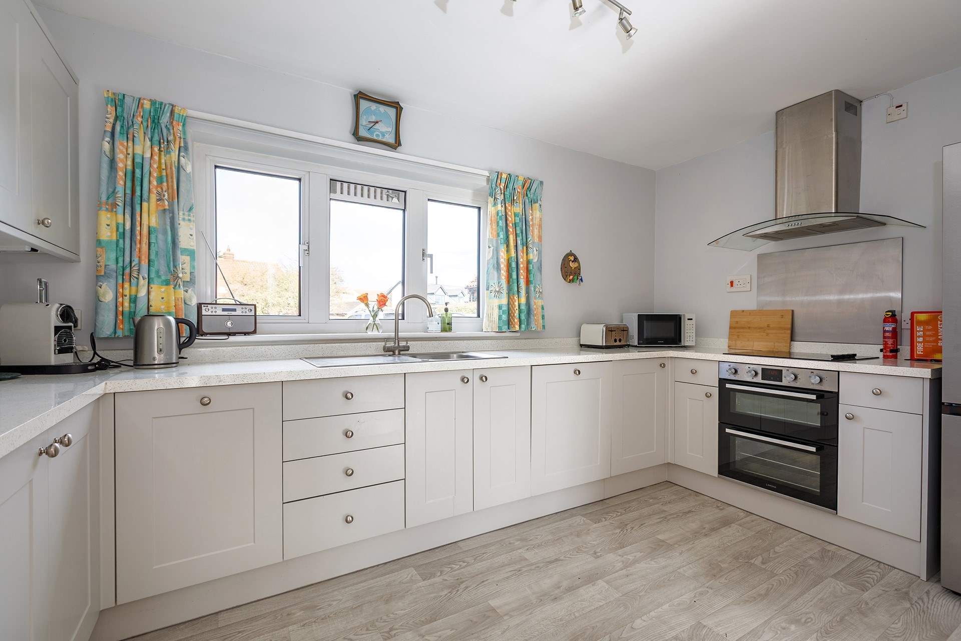 A stylish well-equipped kitchen includes a De Longhi coffee machine, please bring your own pods.