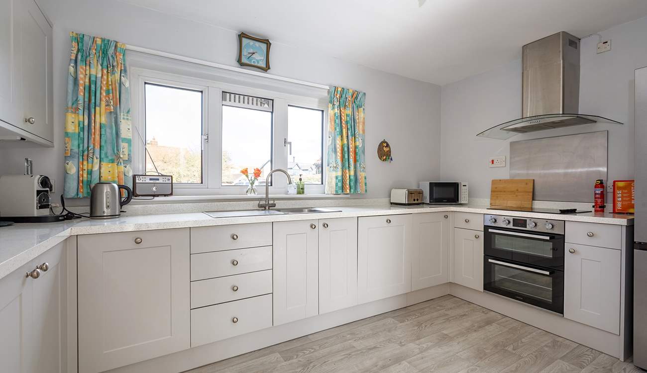 A stylish well-equipped kitchen includes a De Longhi coffee machine, please bring your own pods.