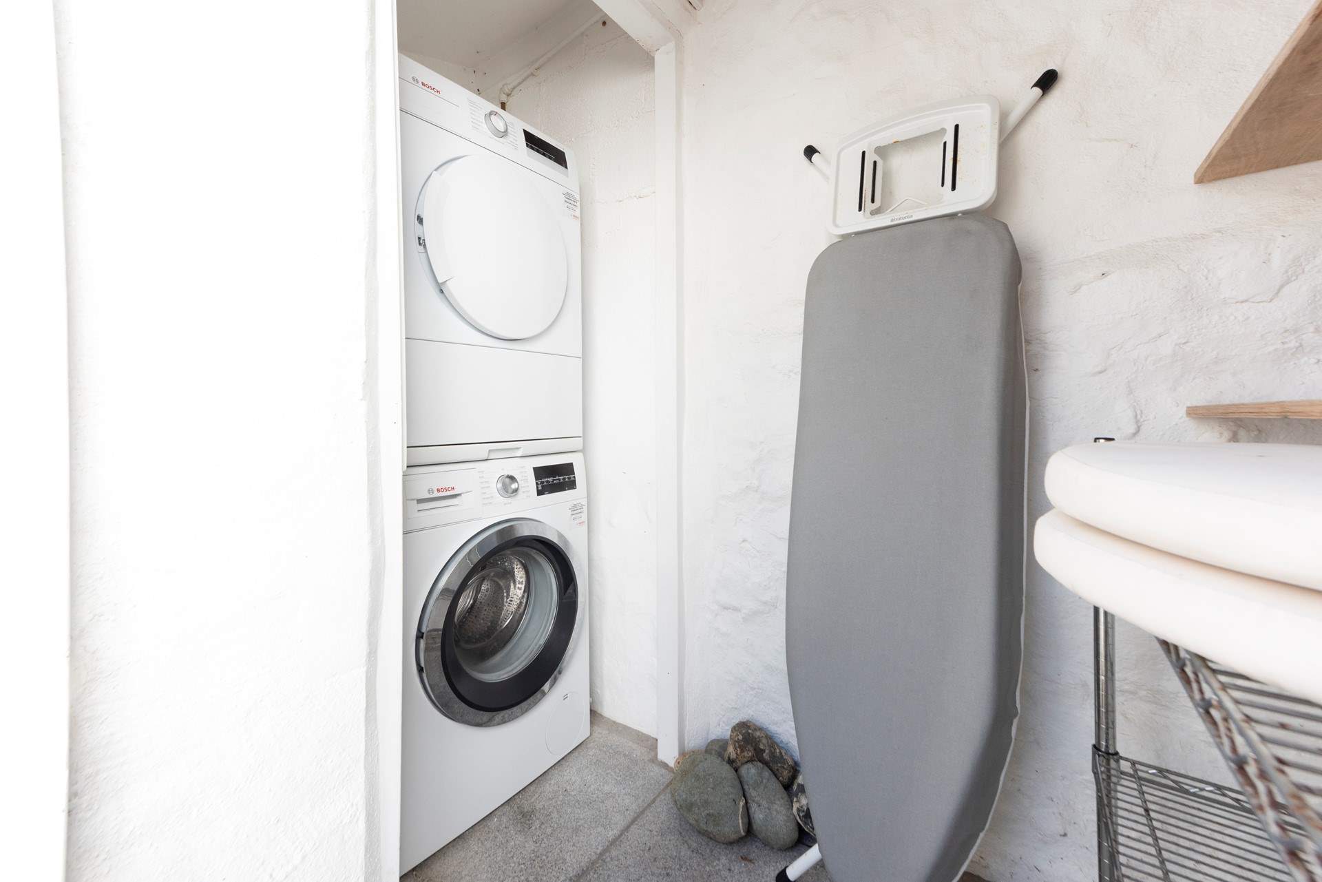 A utility-room is housed in one of the courtyard outbuildings.