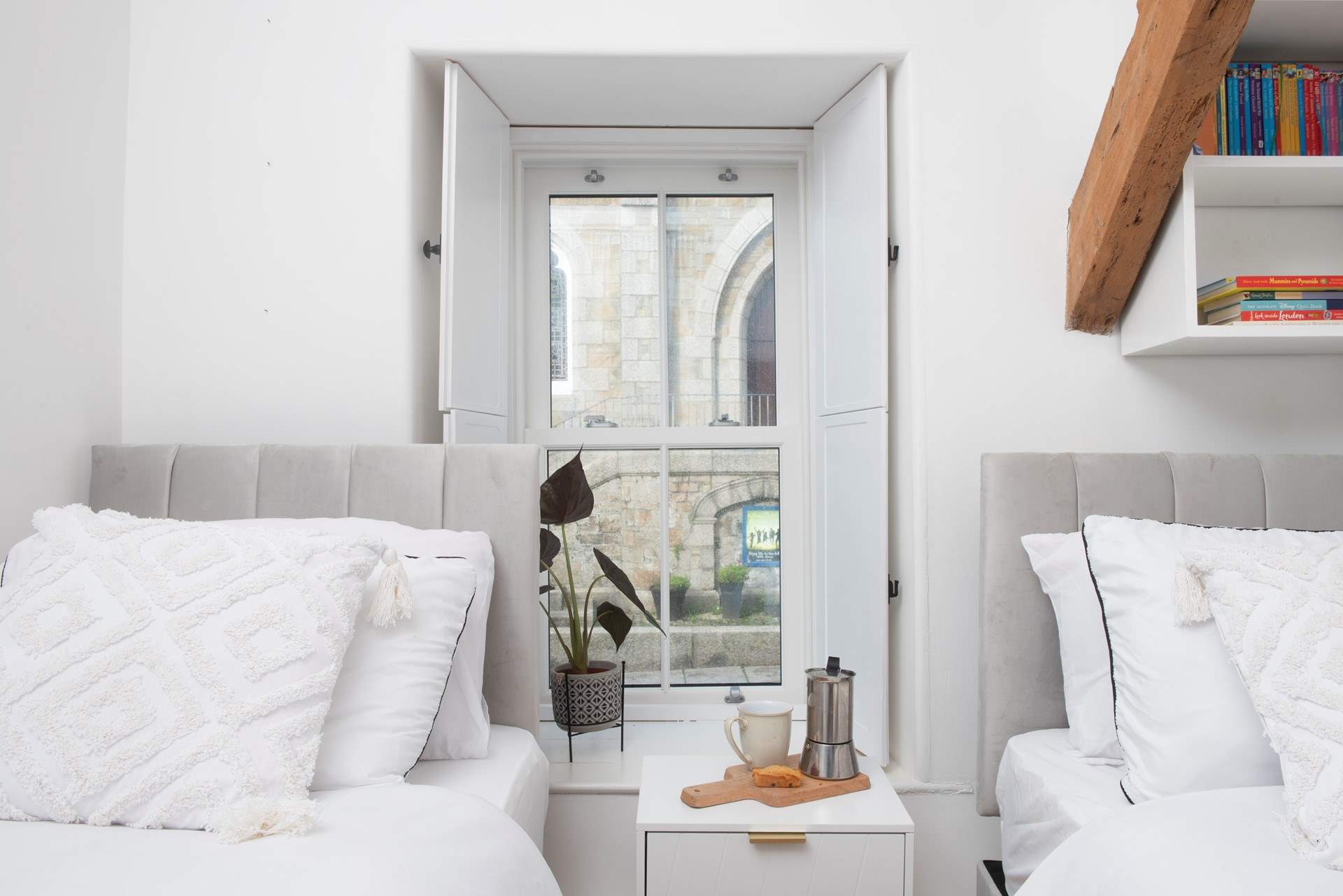 Framed by the window the view of the church.