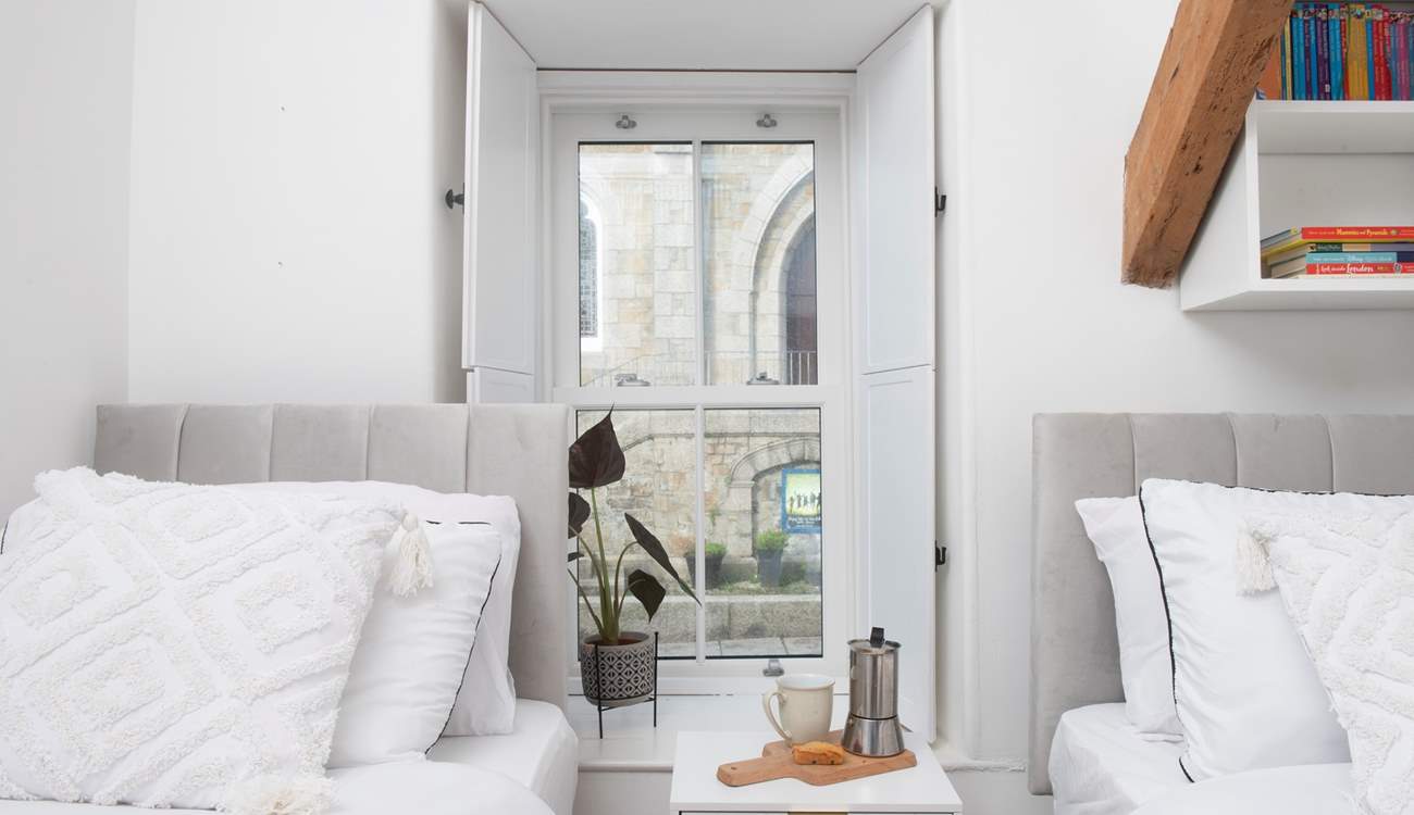 Framed by the window the view of the church.