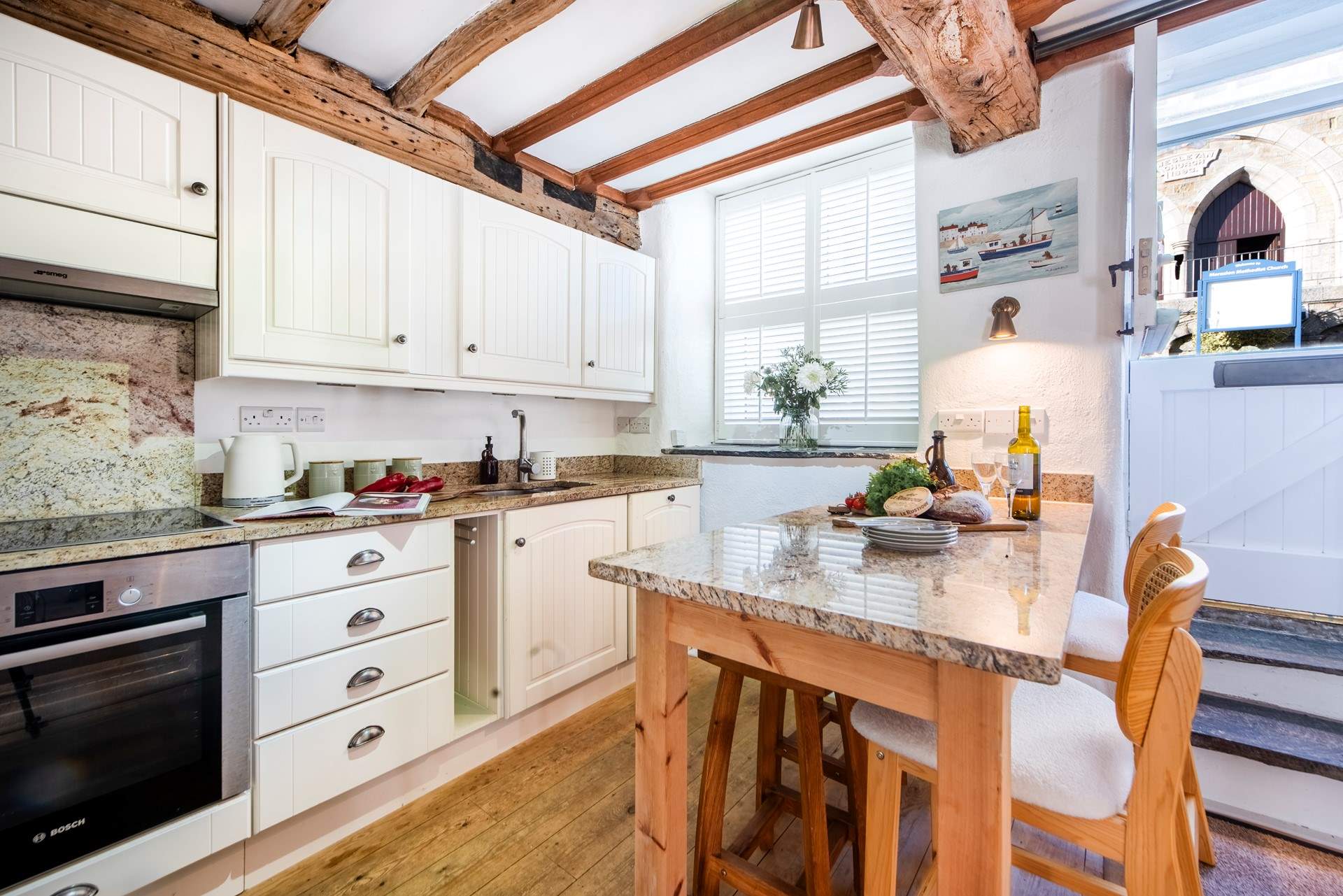 A well appointed kitchen and a very social space.