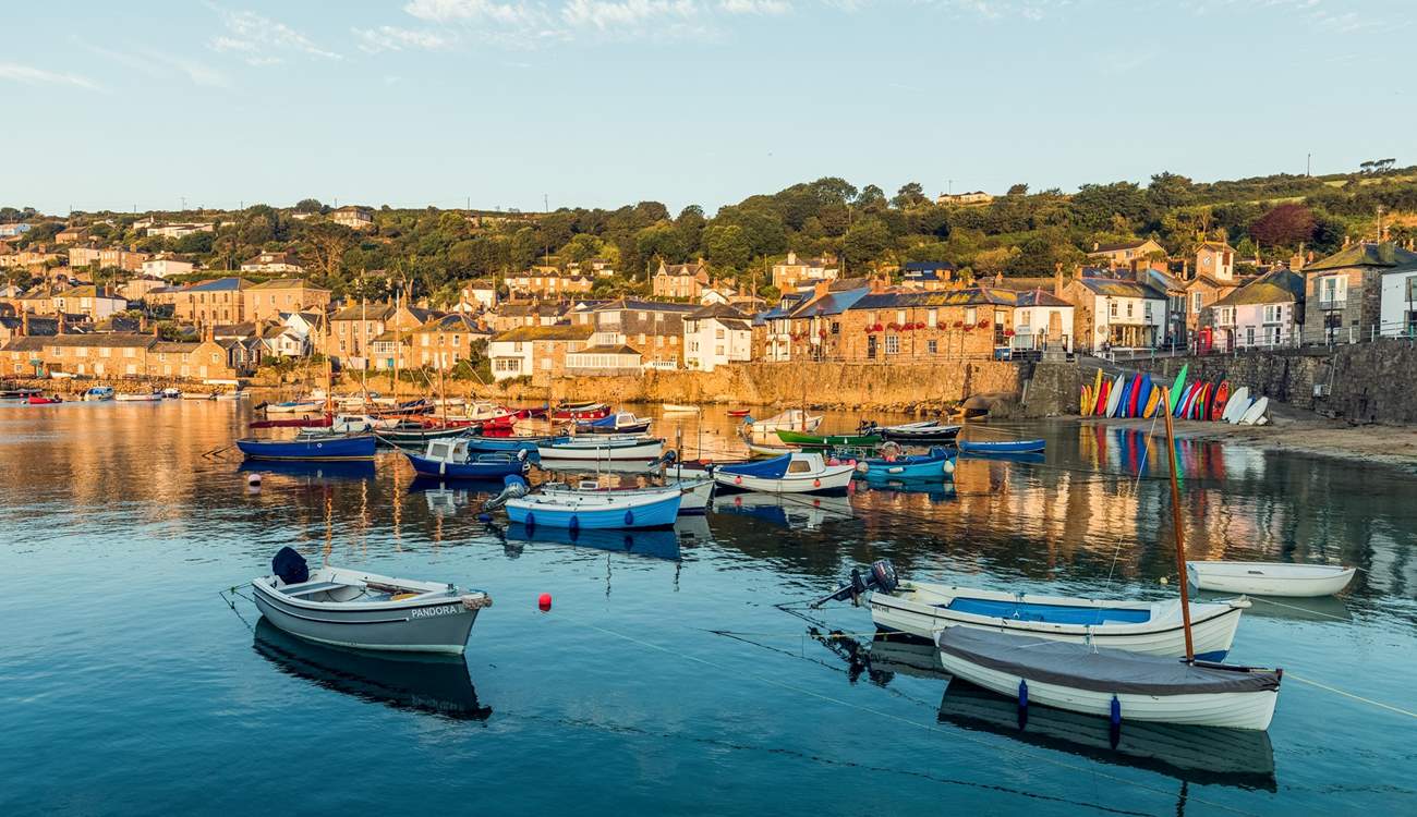 Take a day trip to Mousehole with its pretty harbour and quaint narrow lanes.