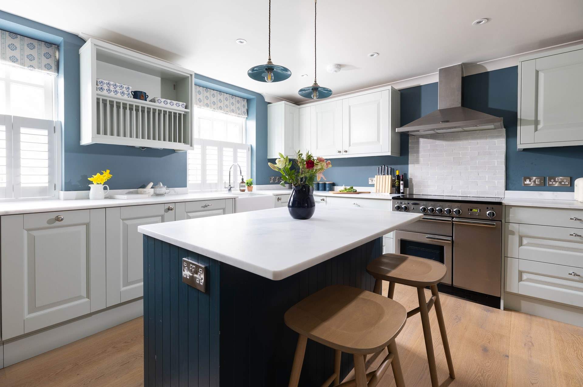 Sit at the island, chatting to your nominated chef. 