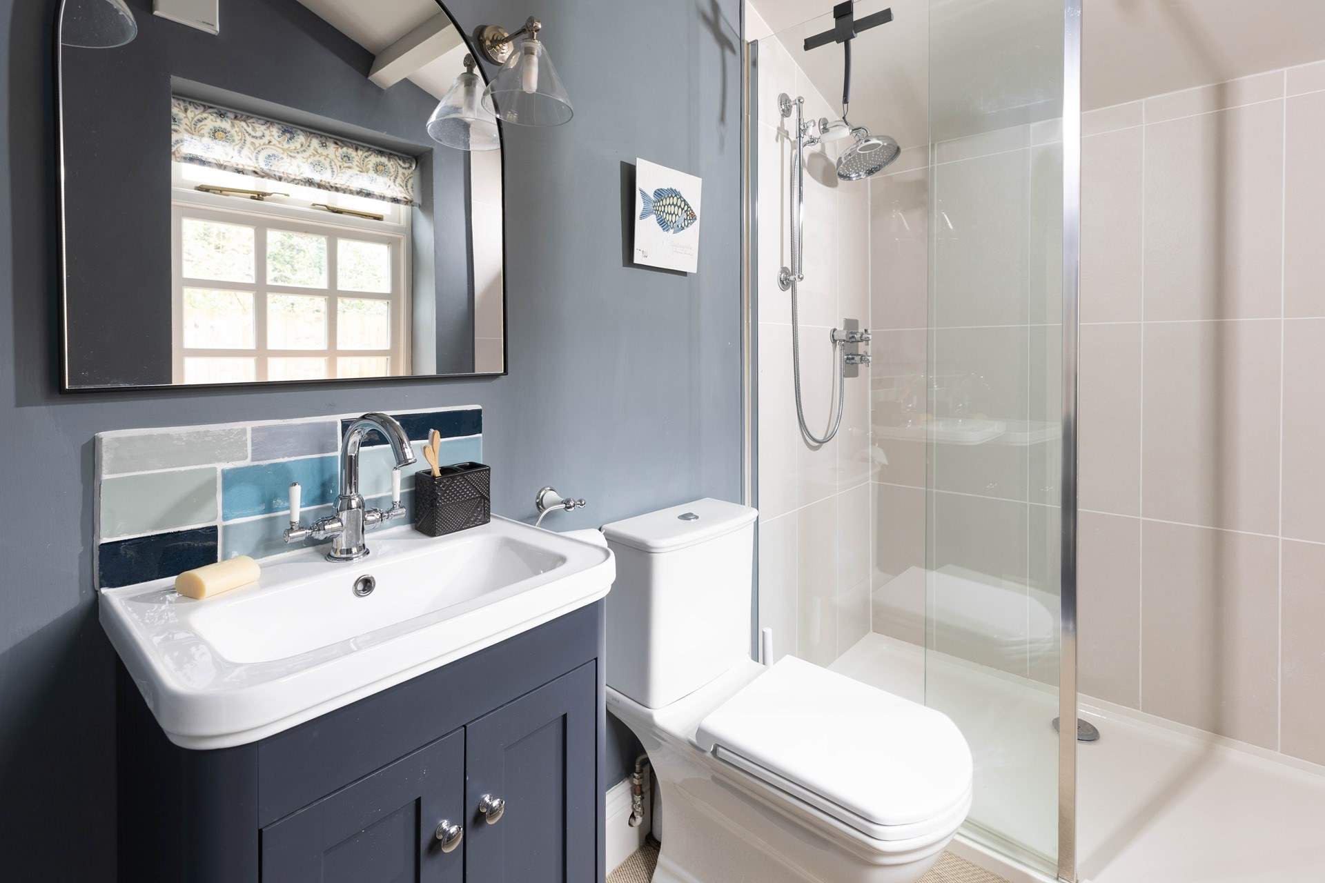 The en suite shower-room to Bedroom 2 has a large shower. 