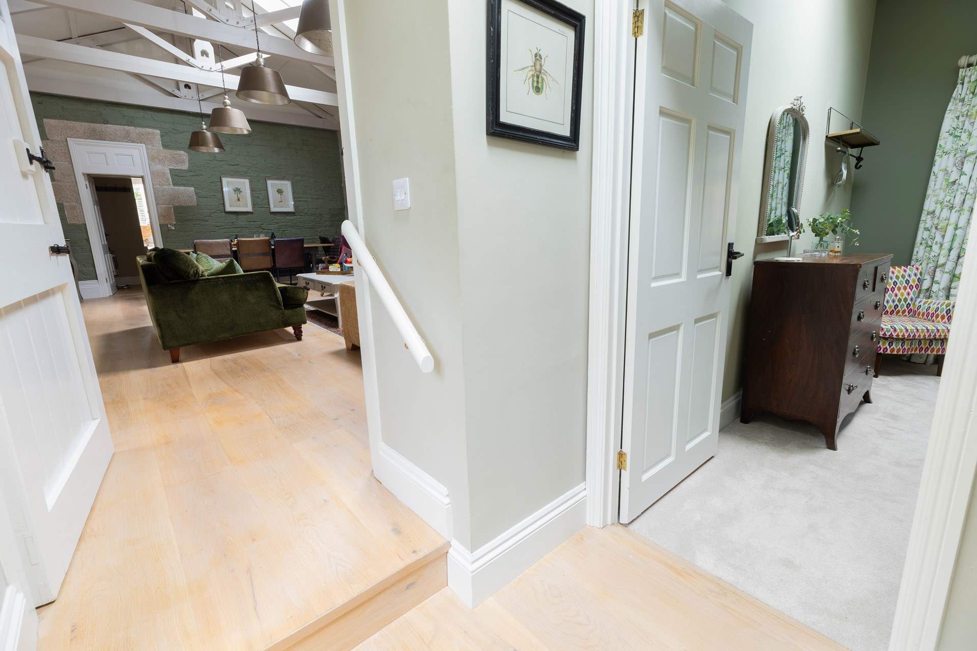 Step down into Bedroom 1 and the en suite shower-room, please mind the slope into the bedroom and shower-room. 