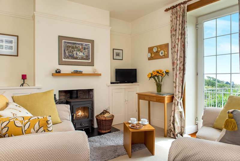 Relax on the sofa and enjoy the fabulous view (the wood burner is decorative only). 