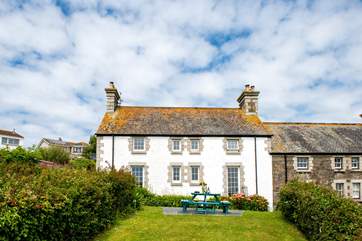 Looking back from the end of the garden to the pretty coastguard's cottage.
