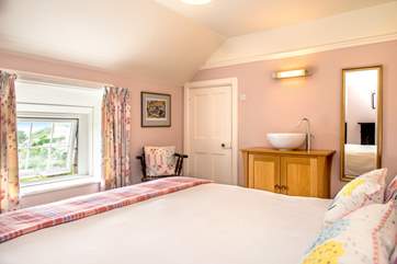 The master bedroom has views out to sea (Bedroom 1).