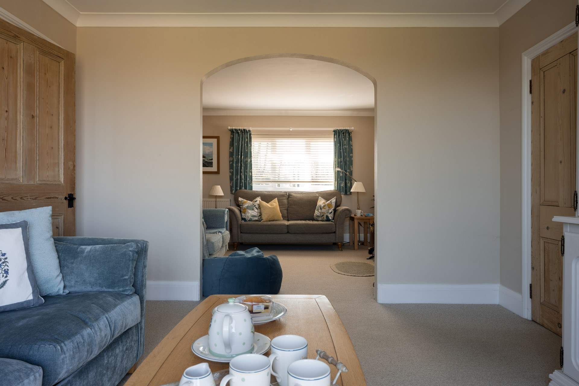 The sitting-room offers relaxation and plenty of space for all the family to come together at the end of the day.