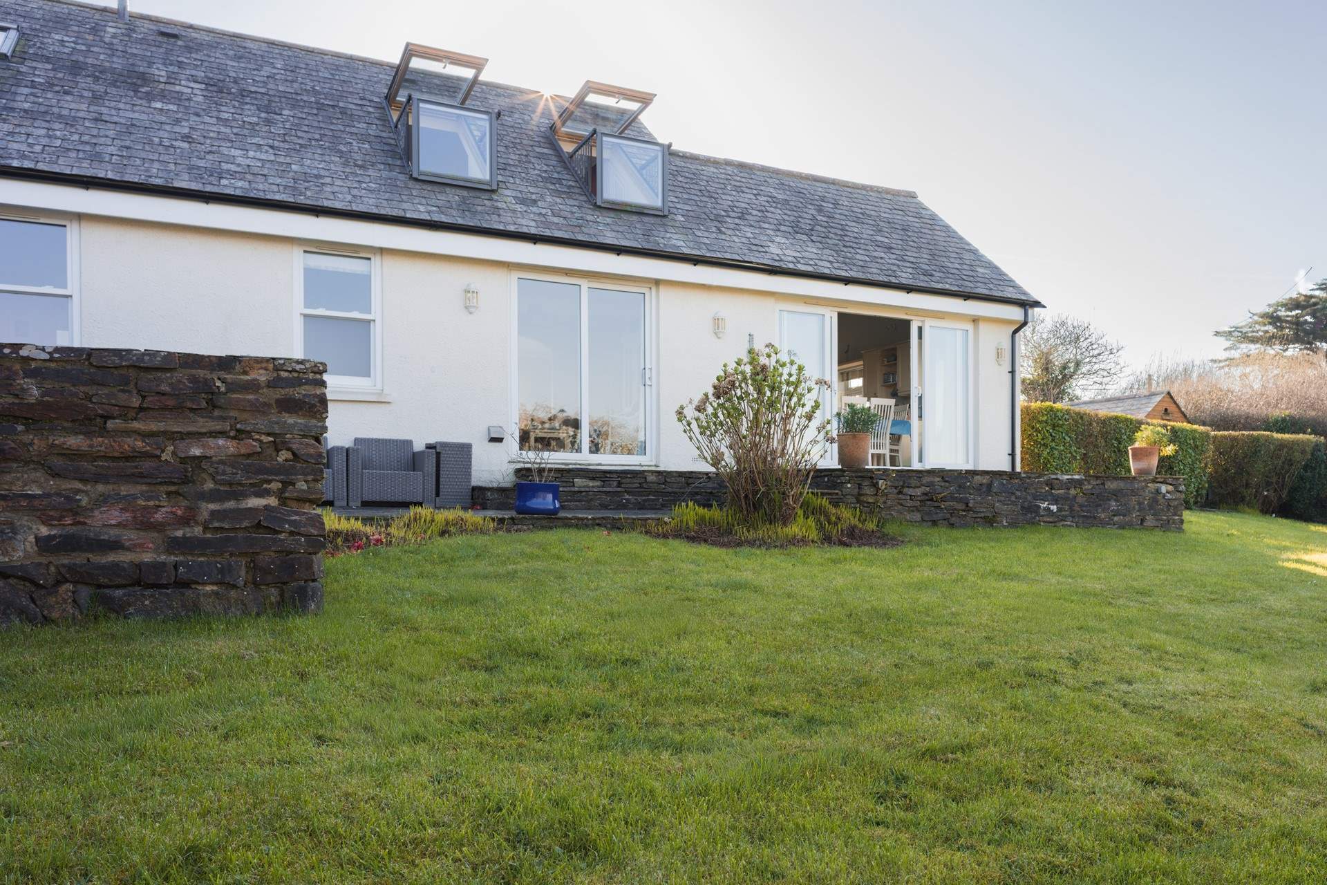 The raised patio will have patio furniture for your enjoyment. 
Please take care.