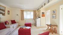 The second sitting-room on the lower ground floor is a great space for the little ones to play.