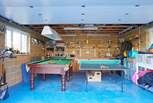 There is a pool table and table-tennis in the garage which everyone can enjoy.