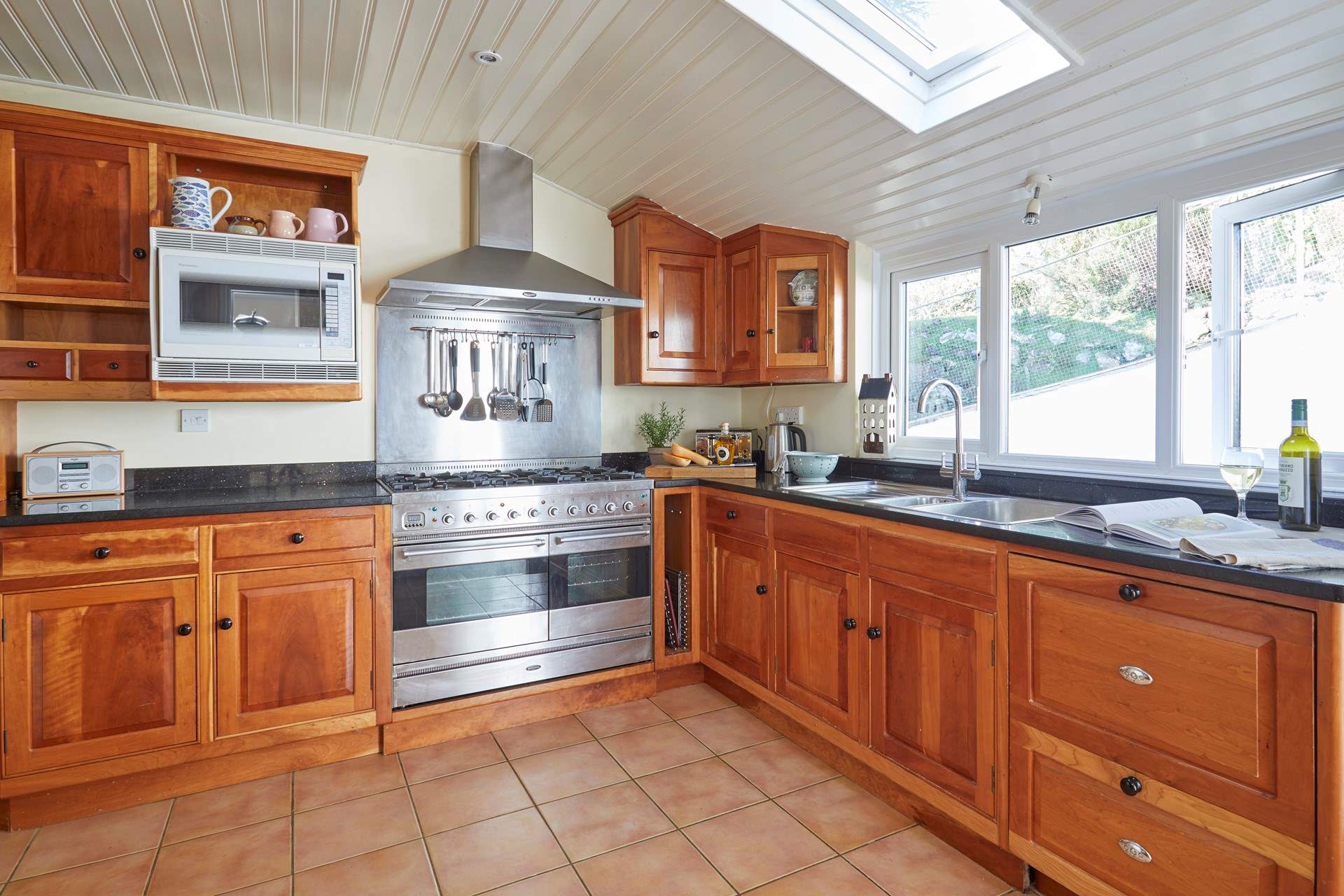 The kitchen looks out onto the pretty garden.
