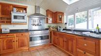 The kitchen looks out onto the pretty garden.