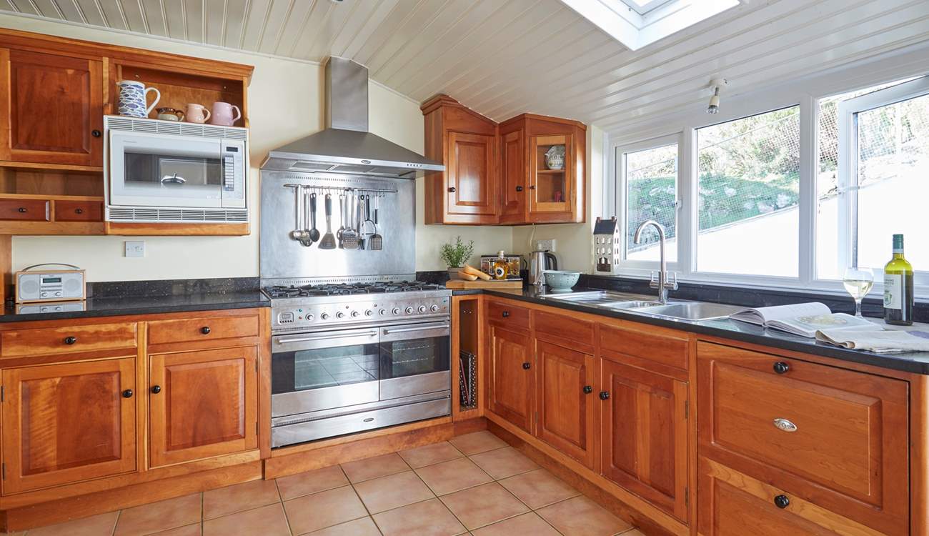 The kitchen looks out onto the pretty garden.