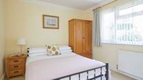 Bedroom 2 with double bed overlooks the pretty garden.