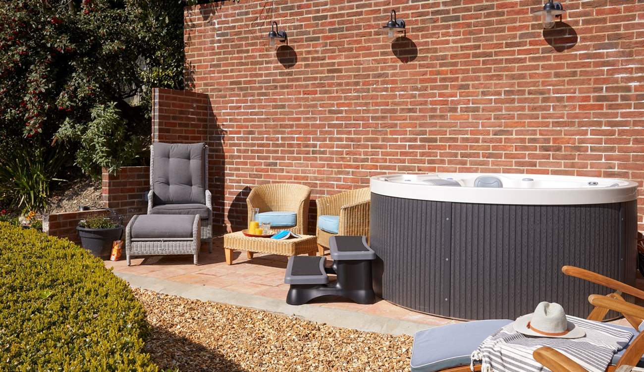 Take an evening dip and relax in the hot tub under a starlit night.