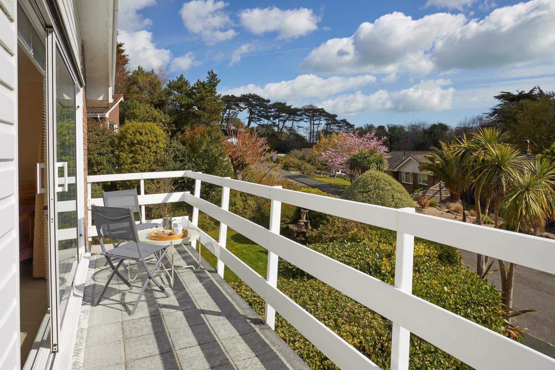 Bedroom 1 has its own balcony, a great spot to relax with your morning coffee.