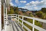 Bedroom 1 has its own balcony, a great spot to relax with your morning coffee.