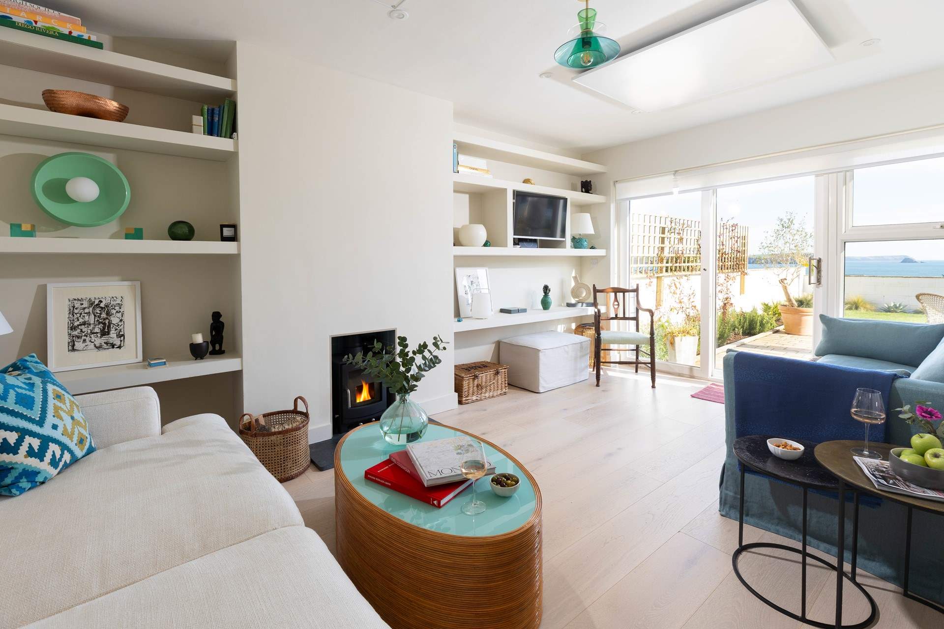 Contemporary touches marry perfectly with traditional furnishings in the sitting-room on the lower ground floor. 