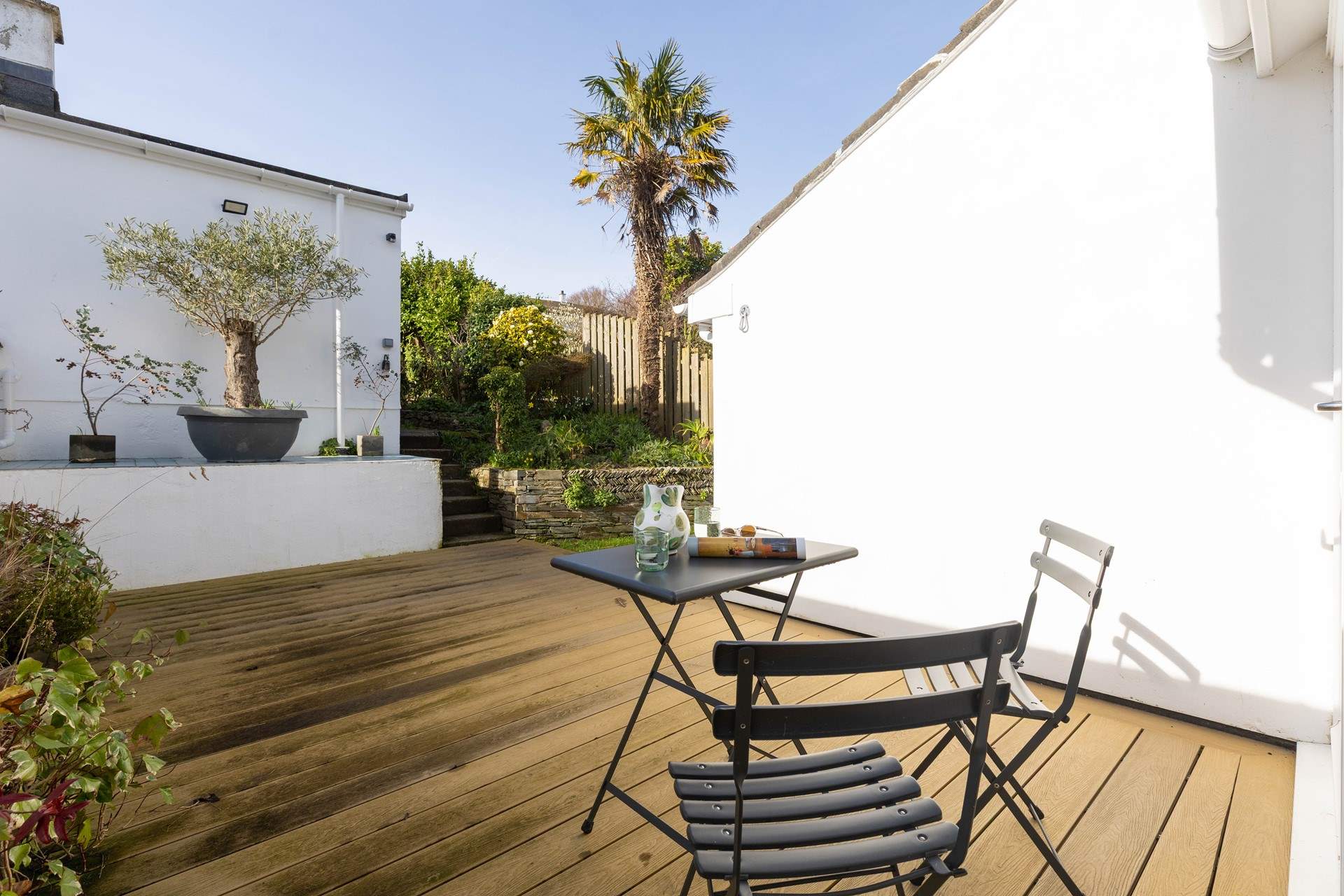 Take your morning coffee in the sheltered front garden. 