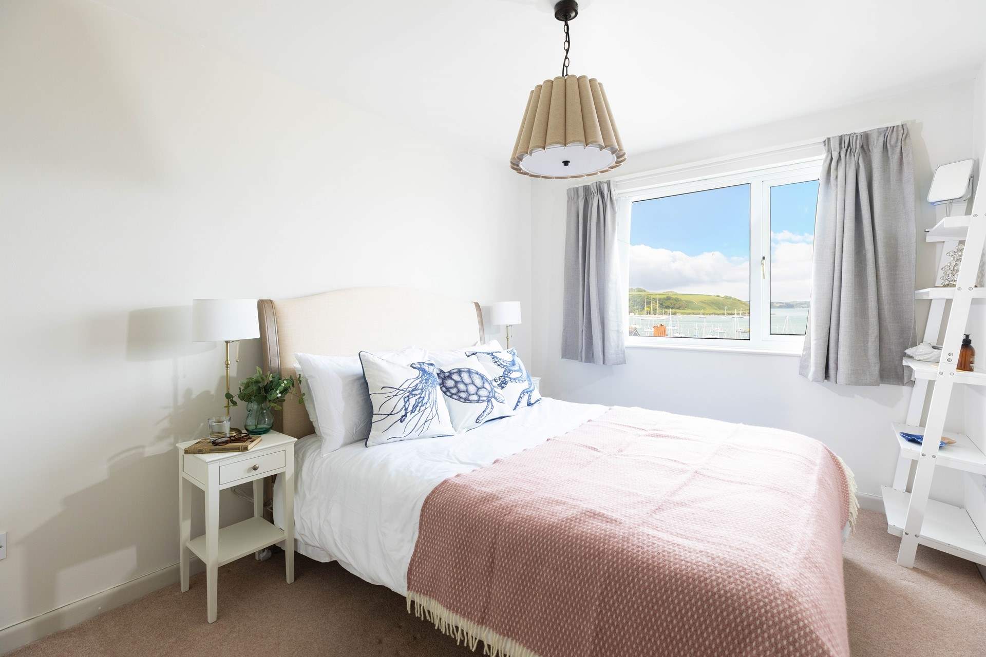 Watch the boats pass by in bedroom 1.