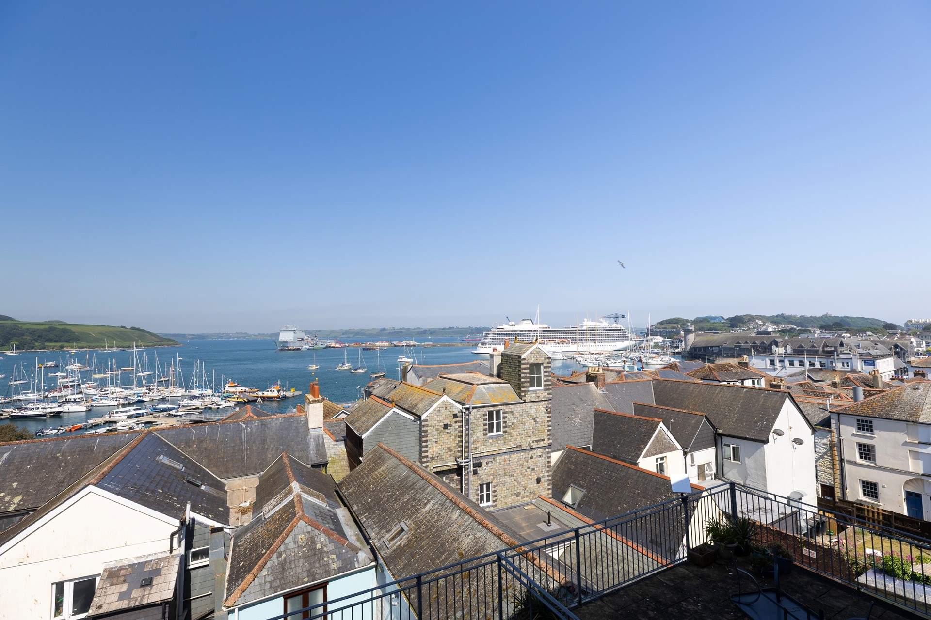 Take in the stunning views across the rooftops towards the vibrant harbour. 