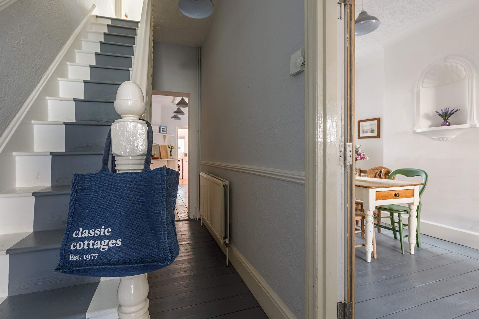 Both practical and stylish with painted wooden floors creating a contemporary modern feel.