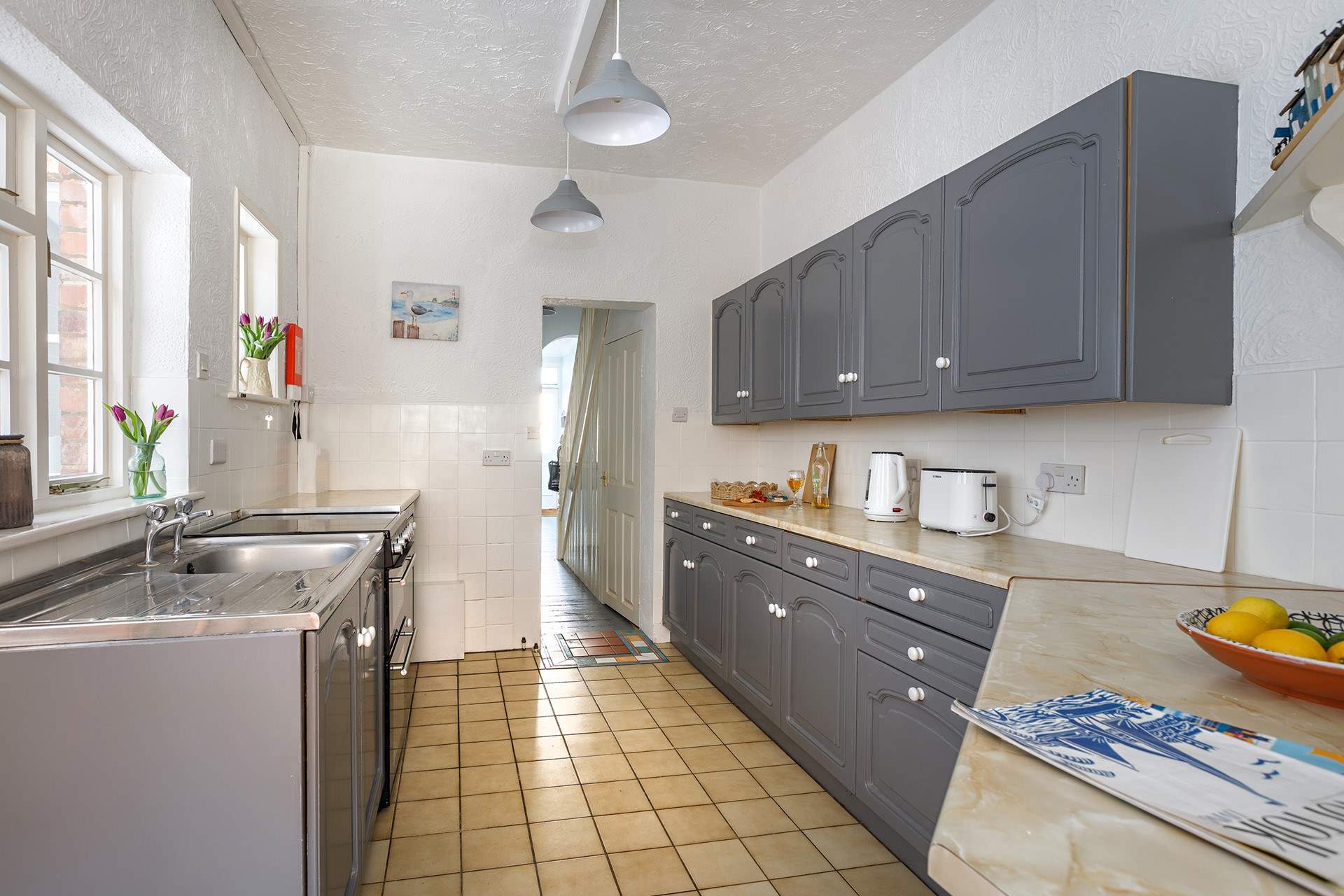 Looking through to the hallway with an additional secret door to the understairs loo!