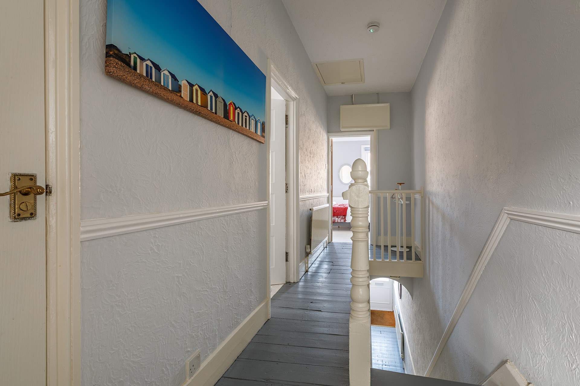 Upstairs discover the  light-filled bedrooms and bathroom with separate cloakroom.