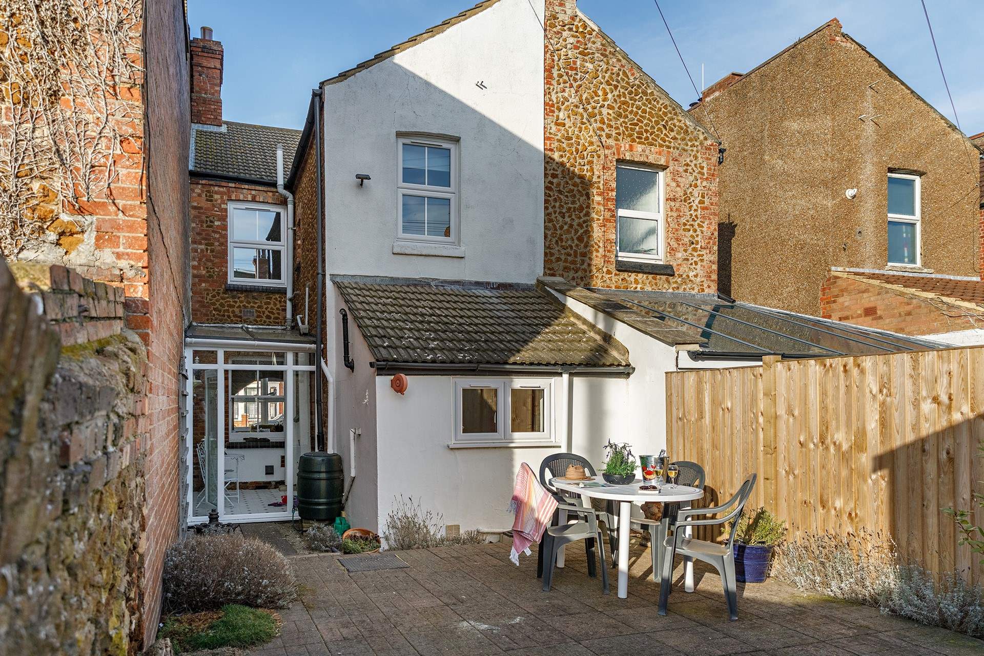 Plan your next day's adventures on a summer eve in the courtyard garden.