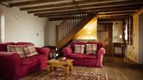 Rustic charm combines with original features and modern comforts. This little gem sleeps four over two floors. 