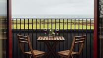Idyllic spot on the balcony off the first floor sitting-room. 
