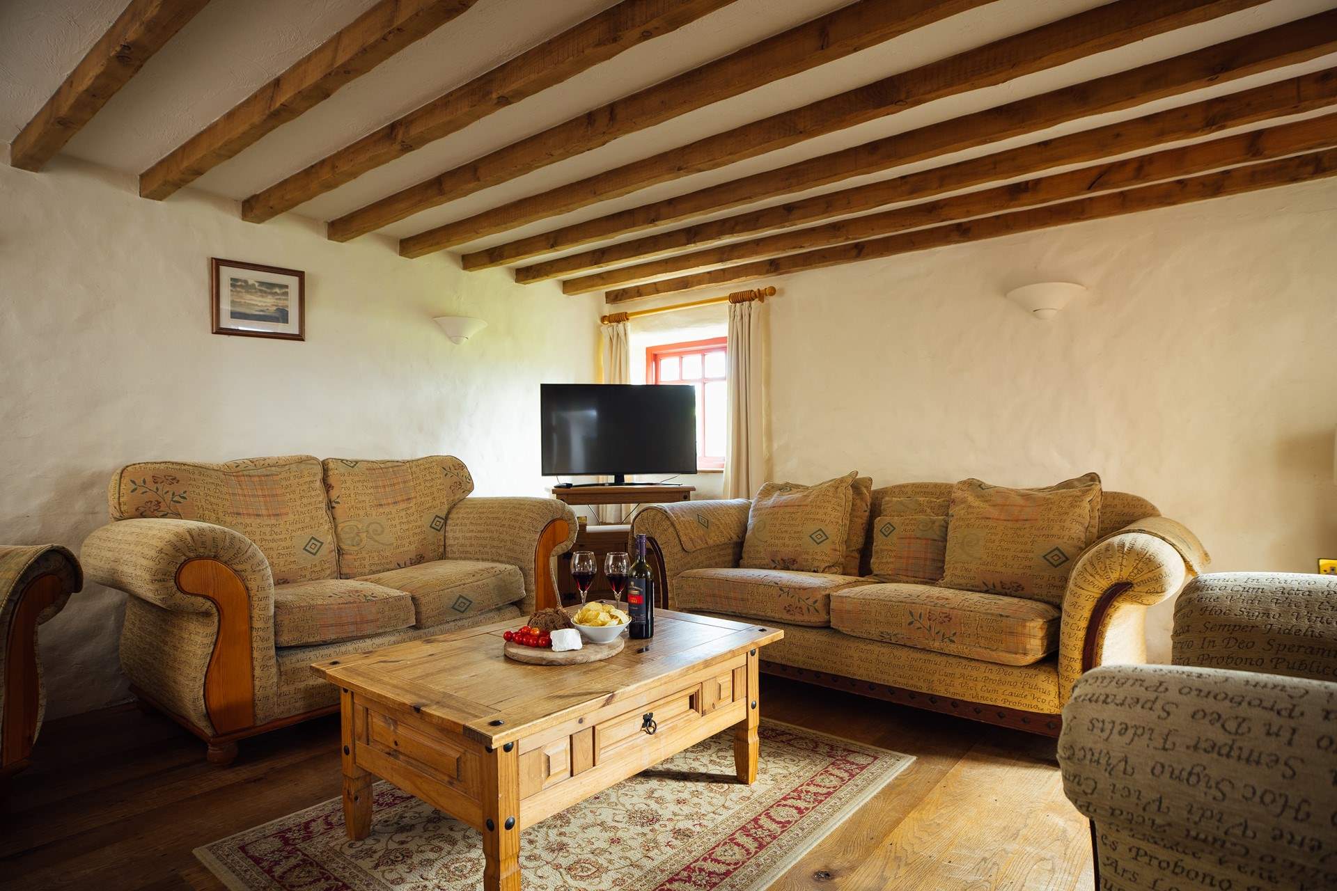 Relax together on the large, comfy sofas after a day on the beach. 