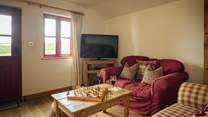 Find your favourite movie and relax in the cwtch. 