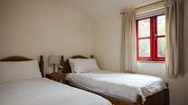 One of two delightful twin rooms on the ground floor. 