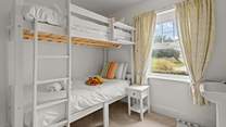 Bedroom 3 is this cute bunk bedroom (the top bunk is only for use by children over the age of six years).
