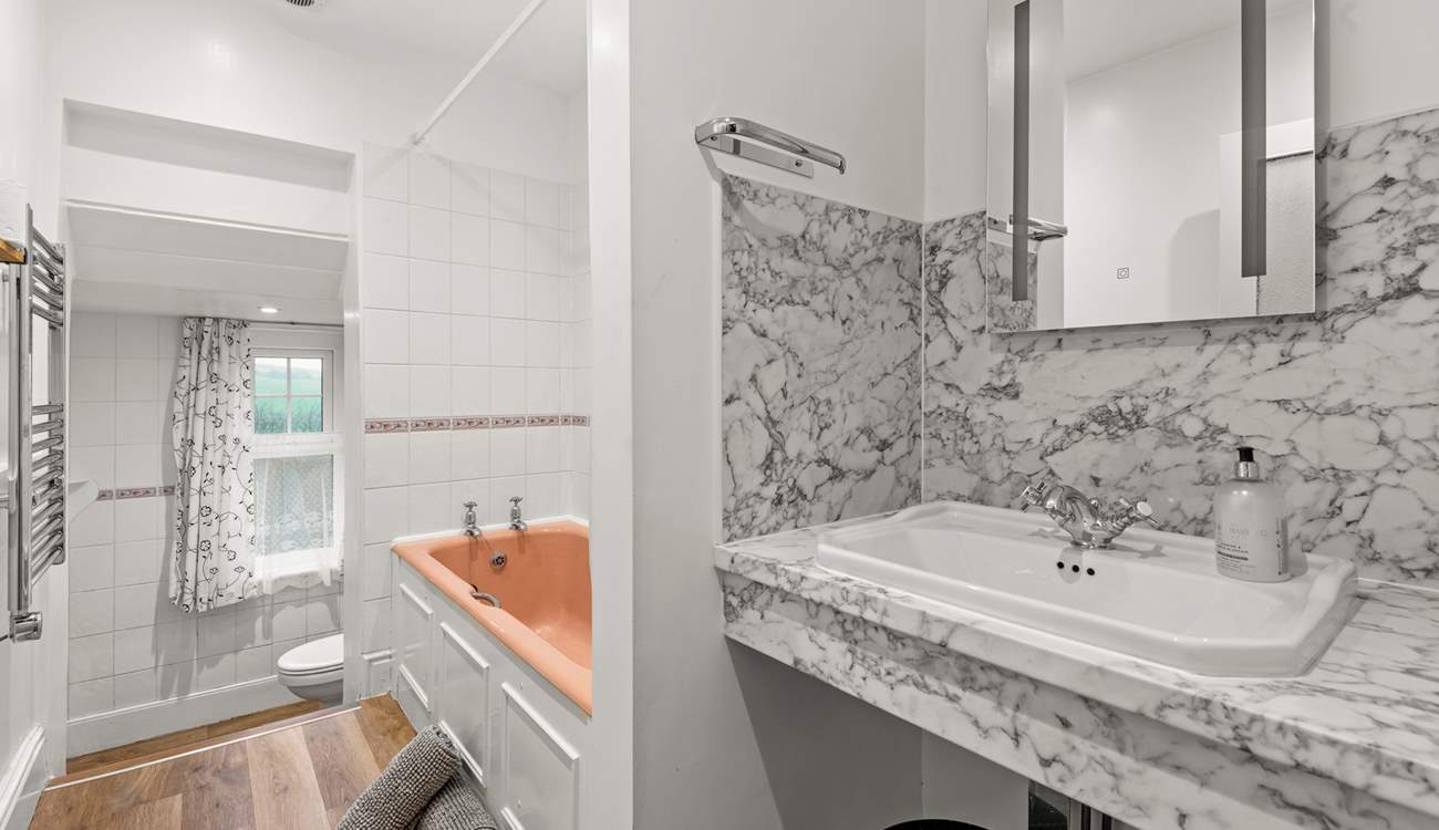 The family bathroom. Please note there are two steps down to the WC area.