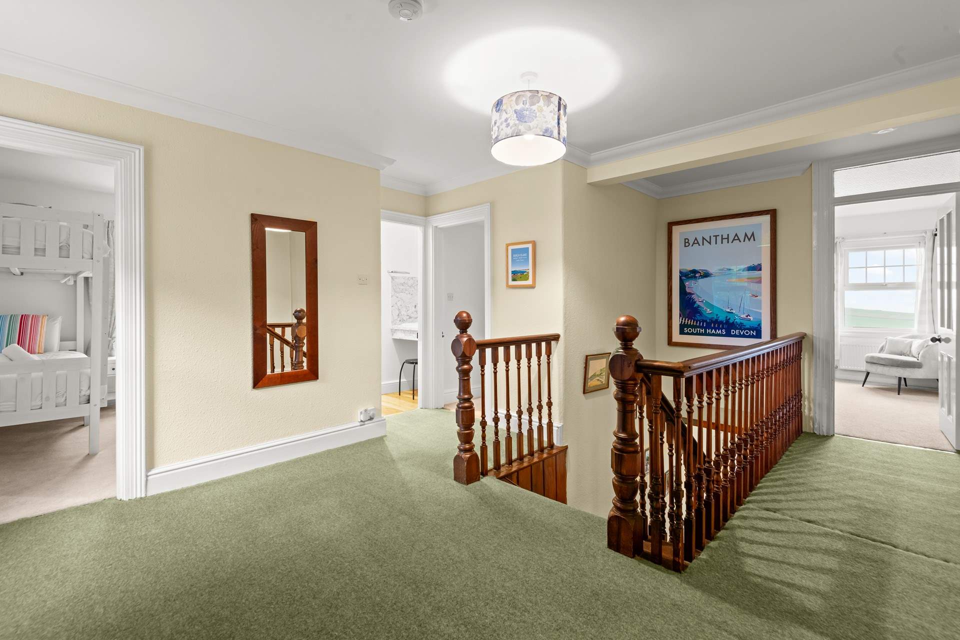 The first floor landing connects all rooms in a rather grand fashion.