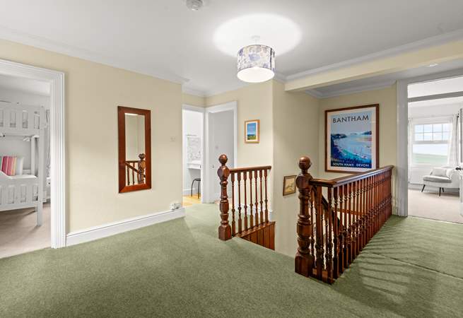 The first floor landing connects all rooms in a rather grand fashion.