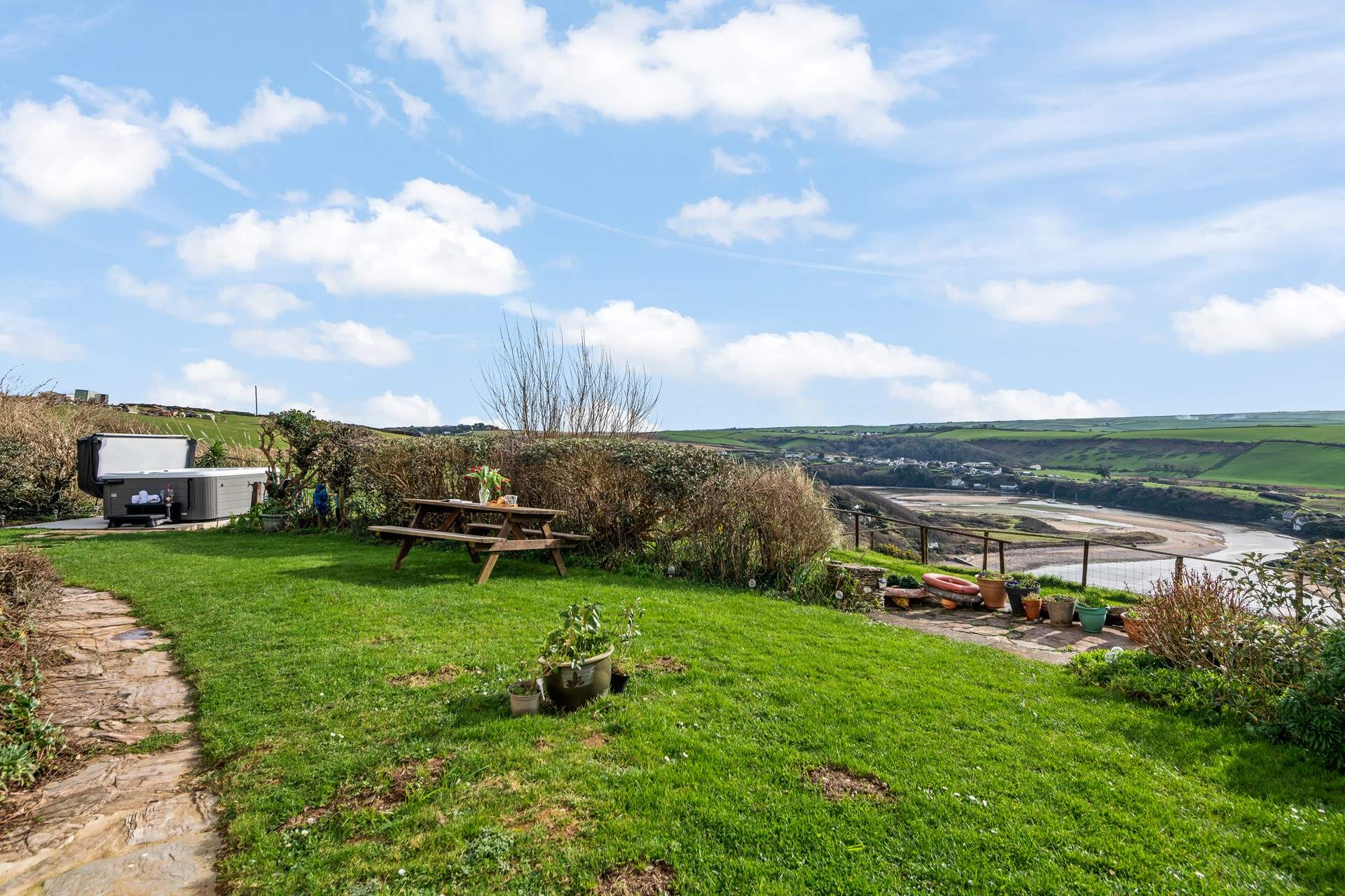 Hours can be spent in this lovely area. Bubbling away in the hot tub, enjoying a glass of something tasty, or just a touch of soaking up the sun.