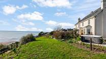 Welcome to Mount Folly Farmhouse. With a hot tub perfectly positioned to enjoy these fabulous sea views, what more could you want from a location.