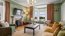 The living-room is spacious yet homely. Perfect for those cosy nights in.