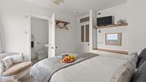 Bedroom 2 also boasts an en suite shower-room.